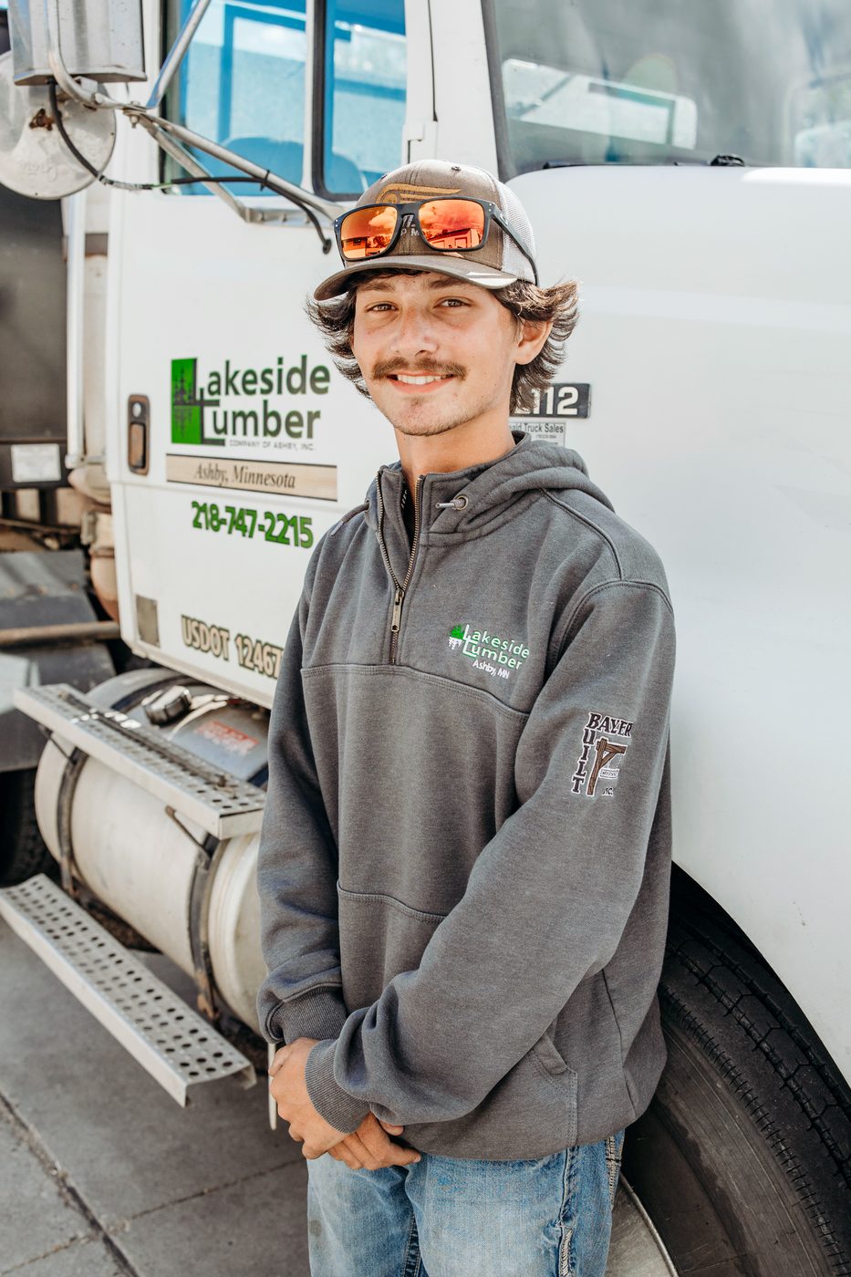 Levi Rossum, driver at Lakeside Lumber Company of Ashby